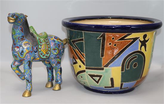 A Chinese pottery jardiniere and a cloisonne horse